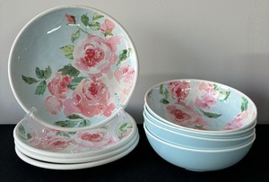 lot 76 image: Sur To Table Set of Four Plates and Bowls in Floral Blue and Pink