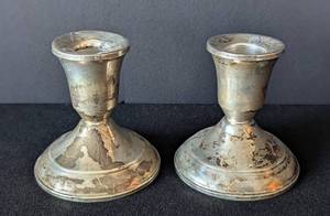 lot 101 image: Pair of Weighted Sterling Silver Candleholders