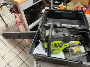 lot 28 image: Poulan Model 4018 Chain Saw With Case
