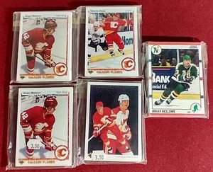lot 53 image: (5) 1990s NHL Team Sets - (4) Flames (1) North Stars