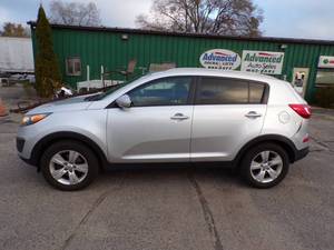 lot 1 image: 2012 Kia Sportage