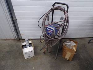 lot 52 image: Magnum XR 7 Power Piston Painter with Respirators and Cleaners