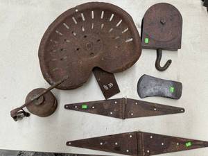lot 71 image: Vintage Tractor Seat, Hinges, Axe Head, pully and Oil can