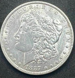 lot 49 image: 1887 Morgan Silver XFAU ondition