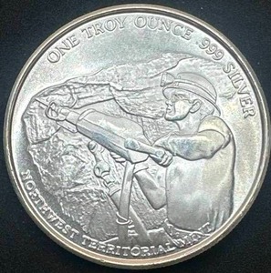 lot 62 image: 1oz .999 Silver Pan American NW Territories Round (rare)