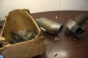 Collection of Used Automobile Exhaust Components and Parts