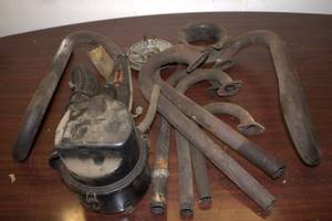 Used Volkswagen Engine Parts Lot Including Air Cleaner and Pipes