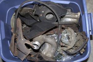 Collection of Auto Parts Including Carburetors and Turbo Components