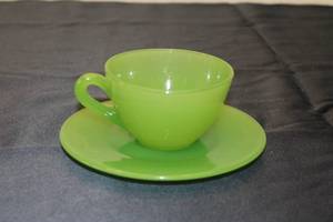 lot 13 image: Vintage Green Cup and Saucer Set