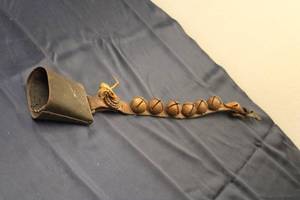 lot 29 image: Antique Leather Cowbell with 7 Jingle Bells