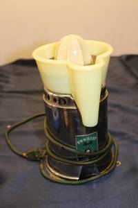 lot 83 image: Vintage Sunkist Juicer with Original Parts & Uranium Glass