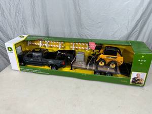 lot 13 image: New Chevy Truck with John Deere Skid Steer, Trailer, and More