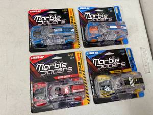 lot 126 image: 4 New Light Up Pull Back Race Cars