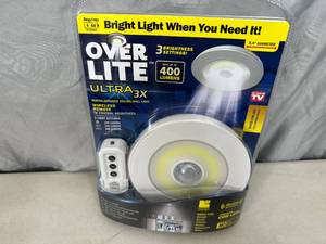 lot 155 image: New Over LiteRemote Controlled  Motion Activated Light Fixture