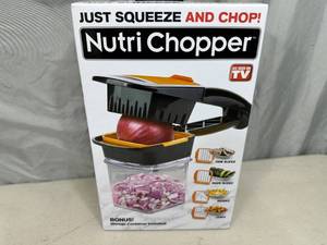 lot 201 image: New Nutri Chopper with Storage Container