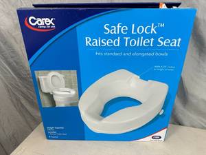 lot 204 image: New Carex Safe Lock Raised Toilet Seat