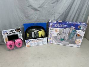 lot 207 image: New Nursery Essentials Kit, Bottle Drying Rack, Infant Ear Protection