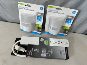 lot 222 image: New GE Surge Protector, 2 Motion Acitvated LED Night Lights