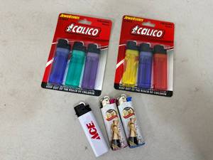 lot 299 image: 7 New Assorted Lighters