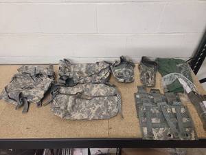 lot 24 image: 1 Molle II Sustainment Pouch-ACU 2 Molle Waist Pack ACU 2 USGI Individual First Aid Kiy Puoch IFAK-ACU 3 Molle triple mag puch ACU 3 Rigger Belts1 US Cotton Dity Bag