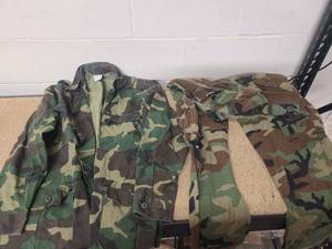 lot 26 image: Camo Shirt and Pants Shirt is an XL pants are 38 x 34