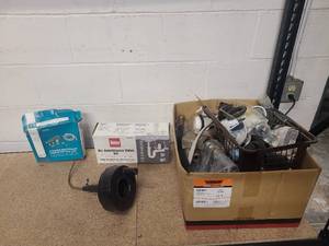 lot 29 image: Box full of plumbing stuff