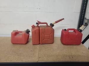 lot 33 image: 3 gas cans