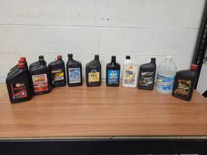 lot 48 image: Batch of misc oil, transmission fluid, air brake condition and more