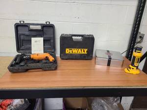 Chicago Electric Hammer Drill, DeWalt carrying case, DeWalt Roto Zip and a Dremel metal tin