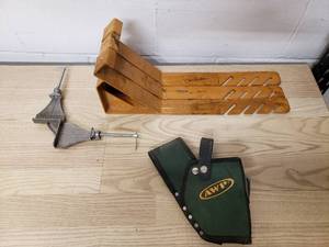 lot 28 image: 3 roofing jacks 1 drill holster 1 45 degree miter clamp