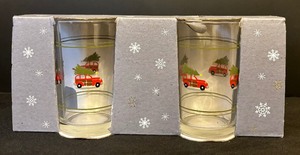 lot 45 image: Set of Four Festive Pottery Barn Christmas Glass Tumblers