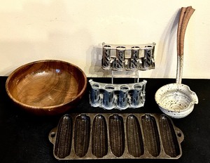 lot 217 image: Various Vintage Finds, Including Vintage McGill 4 Barrel High Speed Coin Changer, Cast Iron Corn Muffin Mold and More