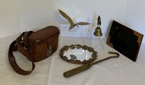 lot 178 image: Vintage Treasures Including Brass Napoleon bell, table bell, servants bell, Brass Accented 5 x 7 Frame, Seagull and Much More