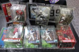 lot 126 image: McFarlane Baseball - Football - Racing Figures  8 Figures