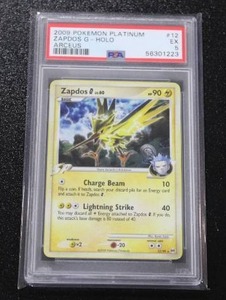 lot 136 image: 2009 Pokemon Platinum Holo Zapdos #1299 PSA 5