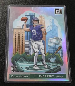 lot 155 image: 2024 Donruss OVERSIZED Downtown JJ McCarthy #11 Rookie Card