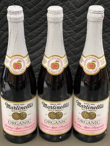 lot 52 image: Martinellis Organic Sparkling Apple-Pomegranate Juice - 3 Bottles