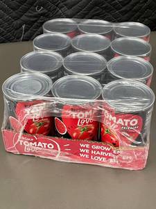 lot 110 image: trolly - Group of 12 Packaged Red Gold Tomato Love Sriracha Diced Tomatoes - 10 oz Each