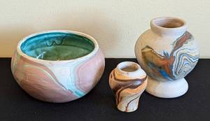 lot 104 image: Three Small Swirled Pottery Vases