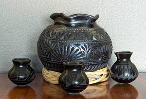 lot 105 image: Four Pieces of Etched Black on Black Pottery from Mexico