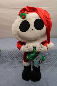 lot 39 image: Disney The Nightmare Before Christmas Jack Skellington Plush Toy in Santa Suit