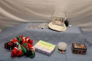 lot 47 image: Holiday Decorative Items Lot - Snowman, Patterned Gloves, Gift Boxes, and More