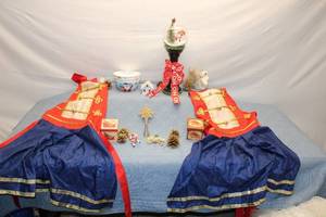 lot 52 image: Set of 2 Nutcracker Themed Christmas Aprons with Holiday Decorations