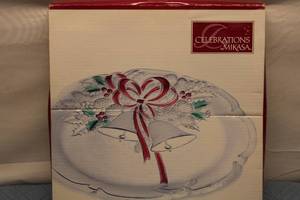 lot 55 image: Celebrations by Mikasa Holiday Glass Platter with Bells and Ribbon Design