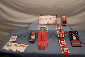 lot 71 image: Christmas Themed Dcor Lot with Santa Ornaments and Pet Photo Props