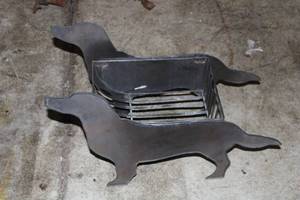 lot 73 image: Unique Decorative Metal Dog Shaped Log Holder