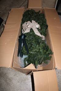 lot 74 image: Pre-Lit Artificial Christmas Tree with Decorative Bow and Stand
