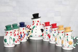 lot 90 image: Set of 10 Snowman Coffee Mugs with Various Hat Colors and Patterns