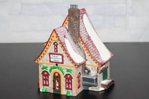 lot B-95 image: Heritage Village Collection North Pole Series Porcelain Popcorn & Cranberry House