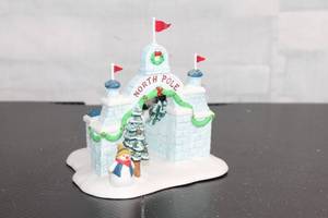 lot B-123 image: Heritage Village Collection North Pole Gate Handpainted Porcelain Accessory